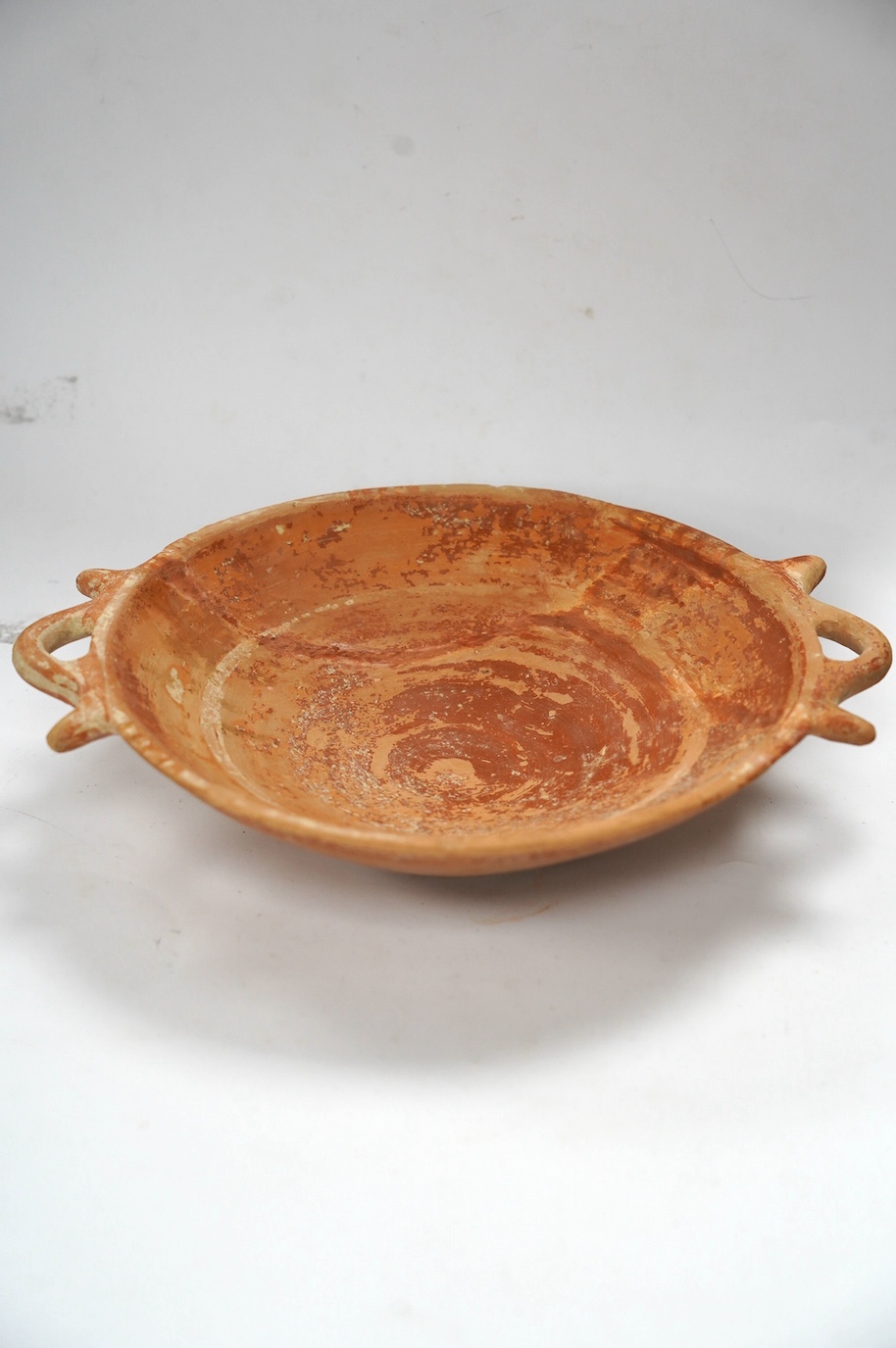 An Ancient Greek terracotta two-handled dish, circa 5th/4th century BC. Condition - good restored condition